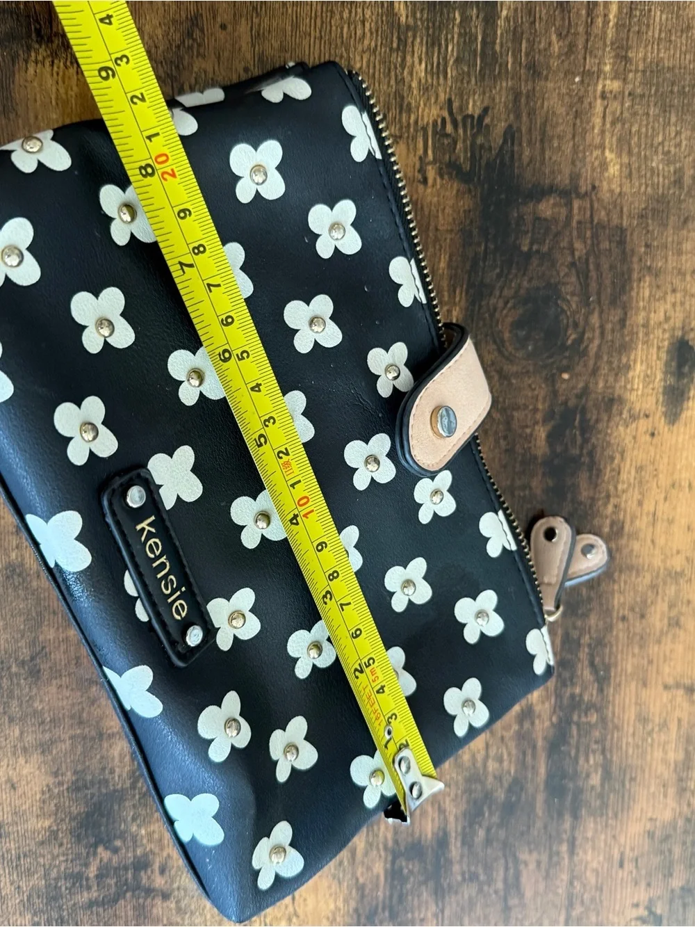 Kensie Black and Cream Floral Zip Wristlet with Tan Snap Strap